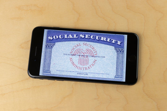 Indianapolis: Circa August 2020: Social Security card blank on a smartphone. The Social Security Administration oversees retirement, disability, and survivors benefits.
