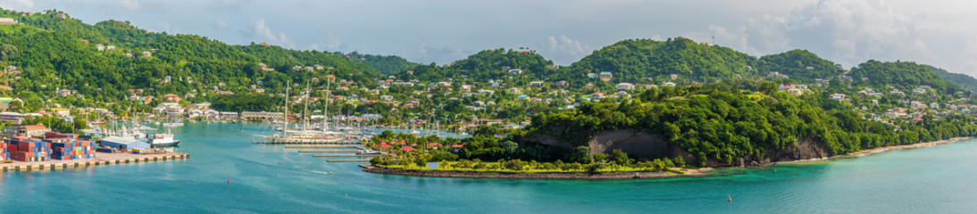 Fototapeta na wymiar A panorama view from the ramparts of Fort St George across the inner harbour in Grenada