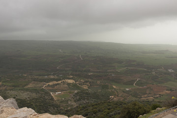Fototapeta premium Clouds over the mountains in Golan Heights, Israel.