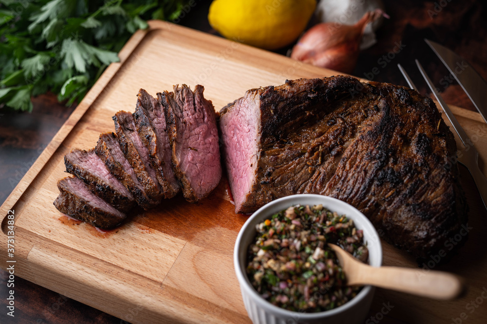 Wall mural grilled tri tip steak with chimichurri sauce