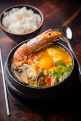 Sundubu, korean hot stone pot with tofu and seafood