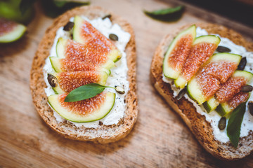 closeup of toasts with slices of figs