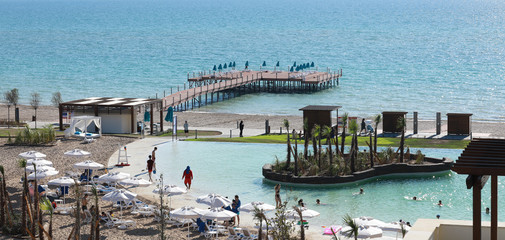 Fototapeta na wymiar sea wooden pier in the resort