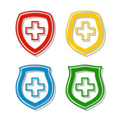 Obraz premium Medical health protection shield cross. Protected medicine guard shield icon concept. Safety mark badge