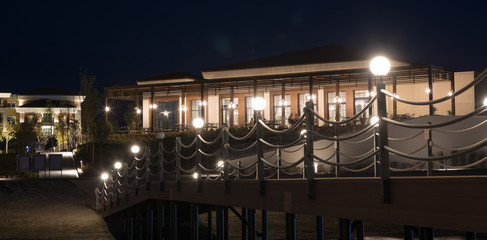 resort wooden pier at night