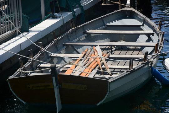 Photograph of a Row boat tied to the pier