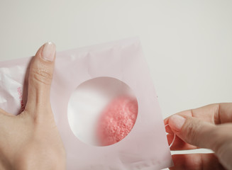 Konjac sponge pink. 100% natural. Hands. Cosmetic. Clay. Cleansing. Hands.