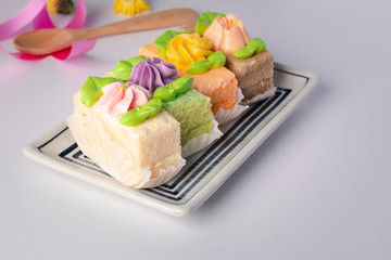 4 pieces of cakes on a white background