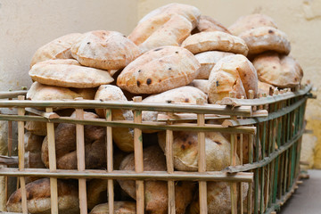 Traditional bread in an old basket in Cairo, Egypt