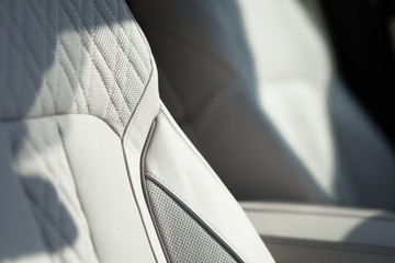 White leather armchair of a luxury car