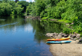 Fototapeta na wymiar Kayak in a small stream