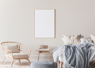 frame mockup in Scandinavian bedroom design, wooden bed, blue plaid, and rattan armchair. Vertical wooden frame on beige wall background, 3d render