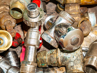 Old taps with a valve for opening water tap. Valve for opening and closing water. Plumbing...