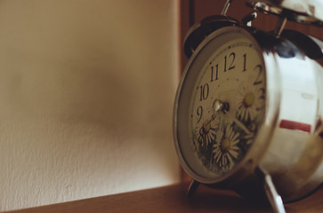 Retro Vintage Look Metal Alarm Clock On Wooden Shelf