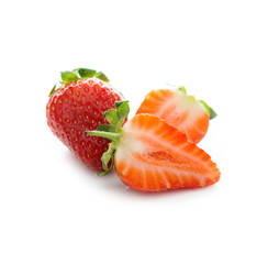 Fresh red strawberries with a reflection on a white background, close-up