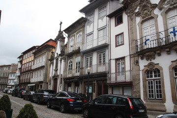 Fototapeta na wymiar Typical street in Guimaraes Center, North of Portugal, Europe