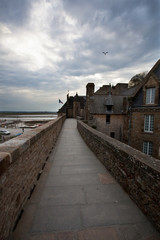 Fototapeta premium Ancient impregnable abbey fortress on an island in normandy