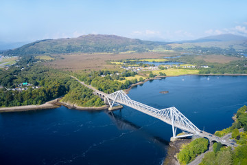 Naklejka premium Connel Bridge steel cantilever structure ocean sea road crossing over Loch Etive in Argyll and Bute Scotland