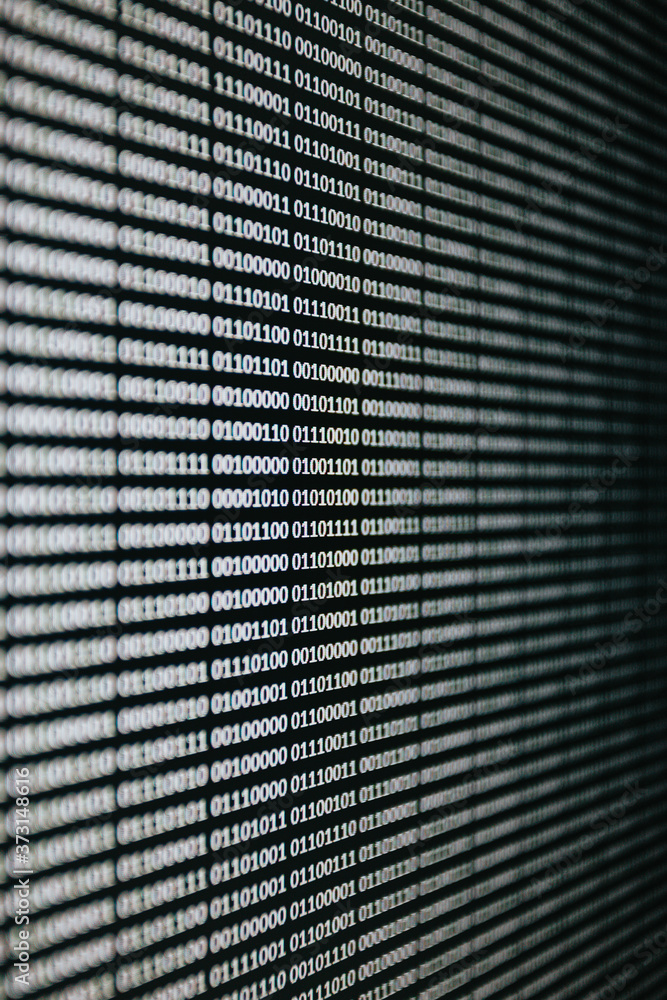 Poster binary language written over a screen