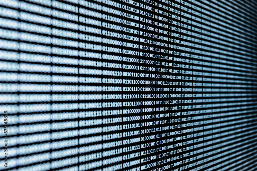 Poster white binary language over a screen background