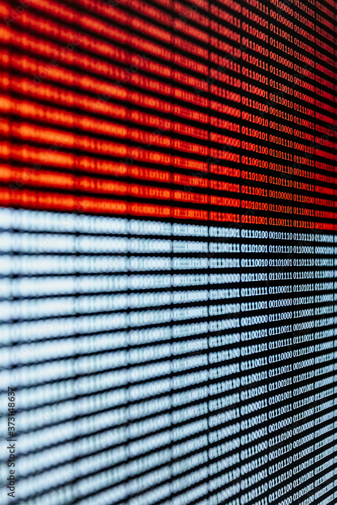 Poster red and white binary language over a screen background