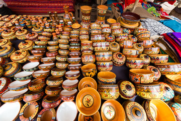 Colorful pottery, craft market of Pisac, near Cusco, Peru