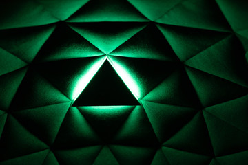 triangle with illumination in green