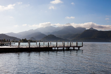 Wooden pier extending into the sea allowing you to admire the horizon