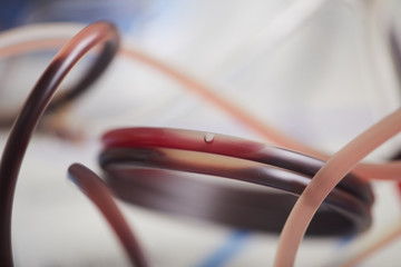 Close-up of tubes with blood it's blood transfusion at the hospital