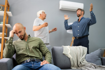 Fototapeta premium Grandfather Having Conflict With Father