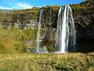 Iceland-view of the Seljalandsfoss waterfall and rainbow