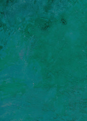 Green scratched textured stucco wall for background.