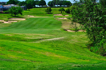 Golf Course Hole with Middle Fairway Ravine Played Downward then Upward