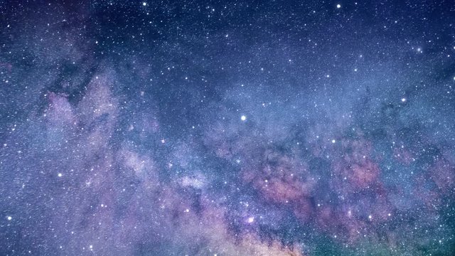 Slow flight through a cluster of stars and galaxies. Billions of stars in the Milky Way galaxy.