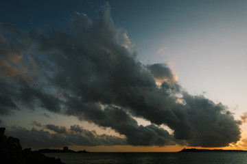 Dark clouds are advancing in the sky above the sea, near the Arza fort, near the island of Mamula in Montenegro.