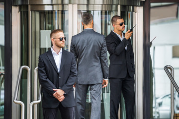Security Guard Service Protecting Business Man