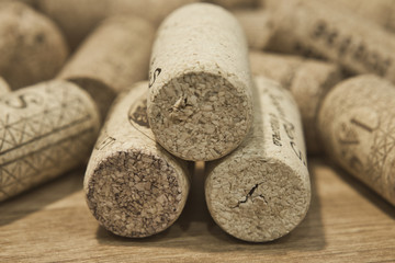 Bunch of wine corks on wooden table