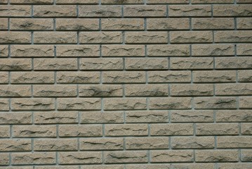 brown gray stone texture from a fragment of a brick wall 