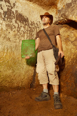 Adventurer in ancient cave finally found mysterious artifact emerald tablet