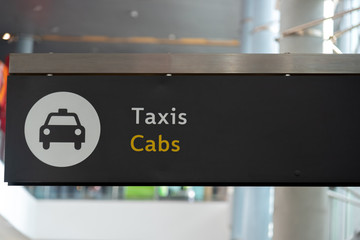 Sign indicating where to take a taxi at an airport in Bogota. Colombia