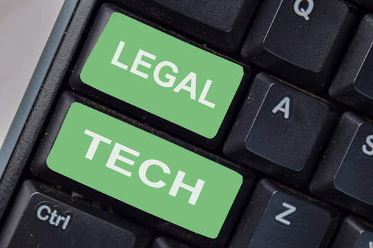 Legal Tech text write on keyboard isolated on laptop background