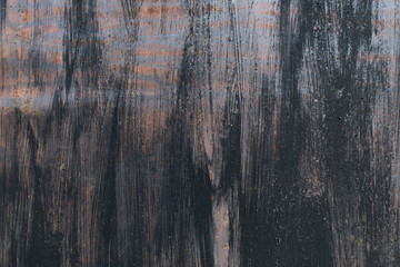 background of gray asphalt. road surface with cracks and potholes.