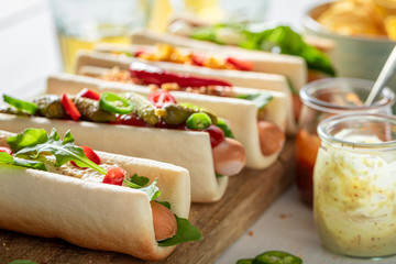 Fresh hot dogs made of summer ingredients