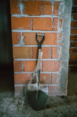 Shovel inside a building in the process of construction in Constancia, Santarem, Portugal