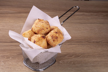 typical Brazilian snack: tapioca dumpling with honey