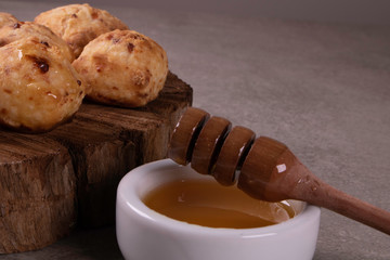 typical Brazilian snack: tapioca dumpling with honey