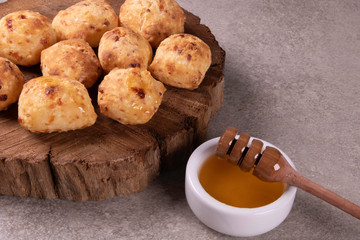 typical Brazilian snack: tapioca dumpling with honey