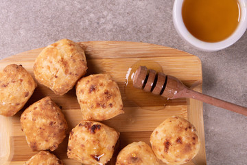 typical Brazilian snack: tapioca dumpling with honey
