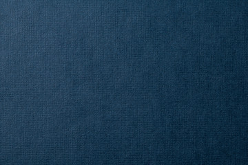 絹目調の質感のある青い紙の背景テクスチャー