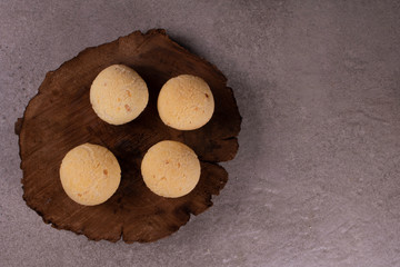 wooden board with traditional Brazilian cheese bread